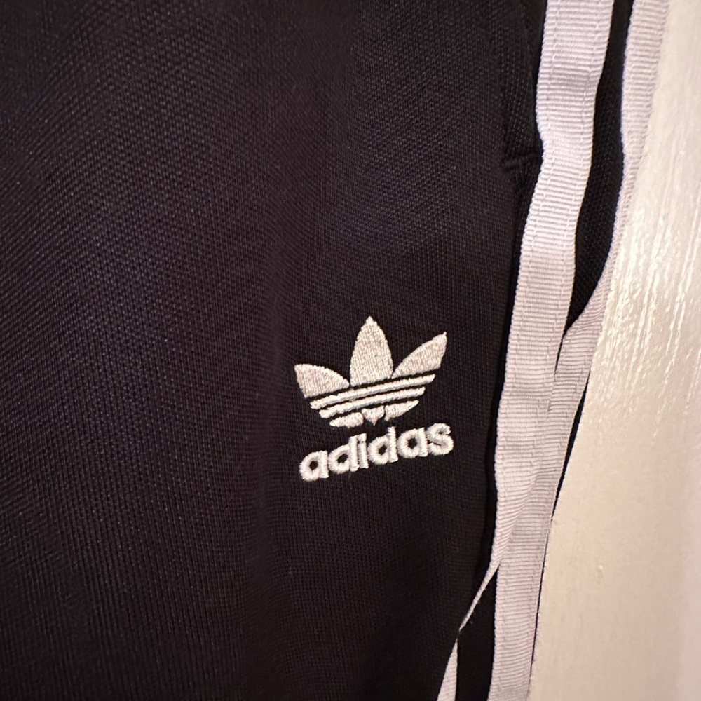 Adidas black and white tie bottom three stripe women’s black joggers size Large